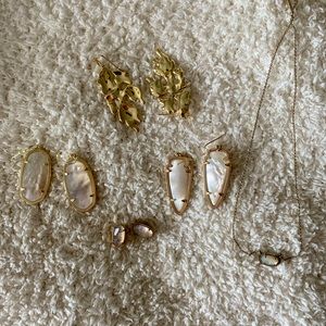 4 pairs of Kendra Scott earrings and a Kendra Scott necklace